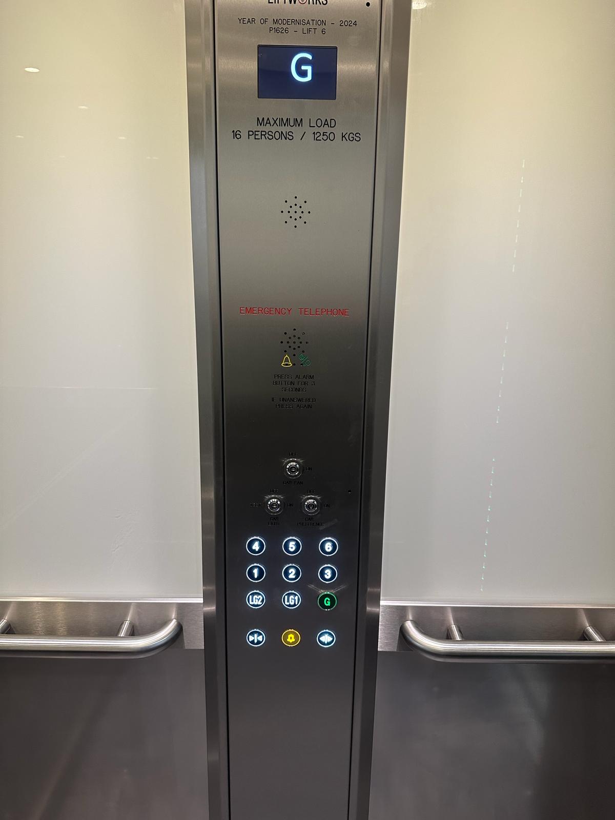 a elevator with buttons and lights
